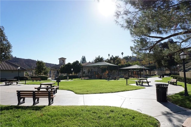 view of community with a yard and a gazebo