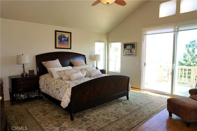 bedroom featuring vaulted ceiling, ceiling fan, access to exterior, and light wood-type flooring