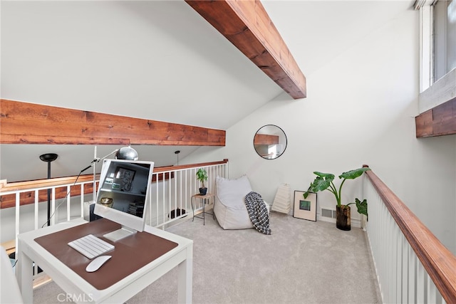 interior space featuring light colored carpet and vaulted ceiling with beams