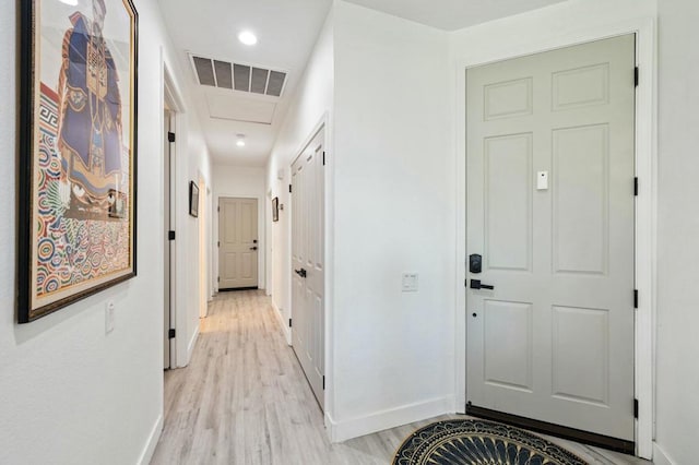 corridor featuring light wood-type flooring