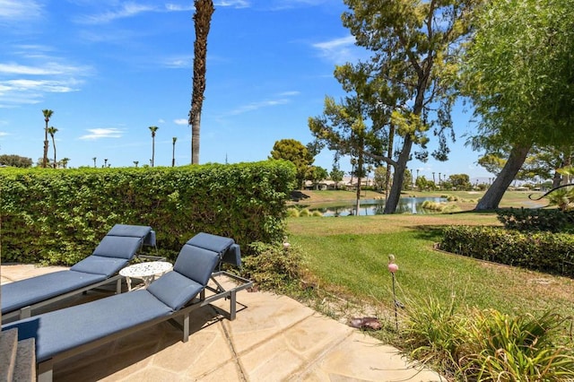 view of patio / terrace with a water view