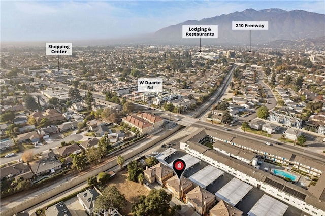 drone / aerial view featuring a mountain view