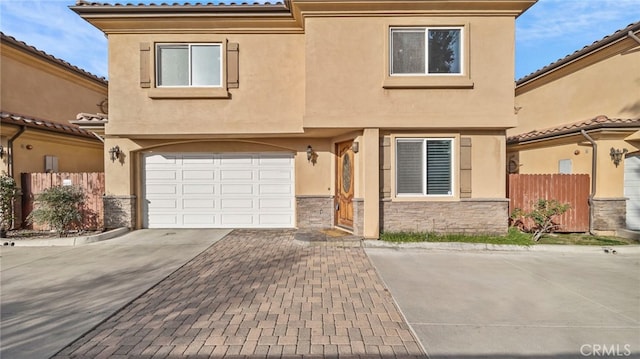 view of front of home with a garage