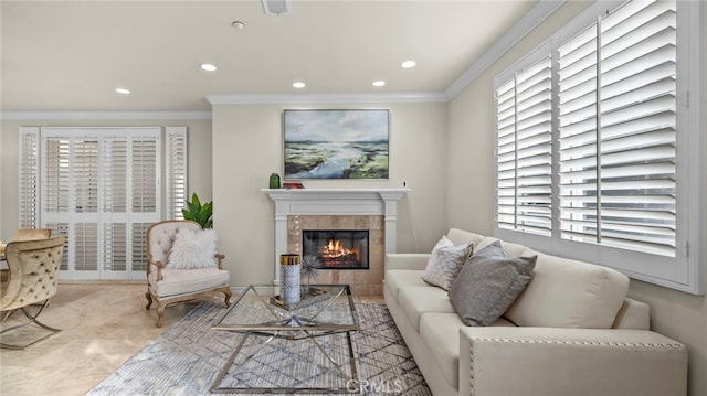 living room featuring ornamental molding and a fireplace