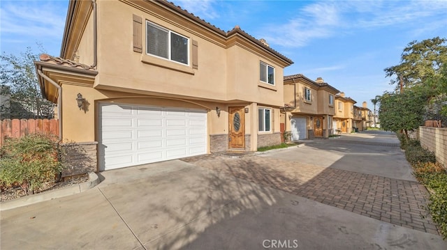 view of front of property with a garage