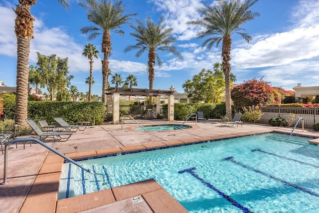 view of pool with a pergola, a patio, and a community hot tub