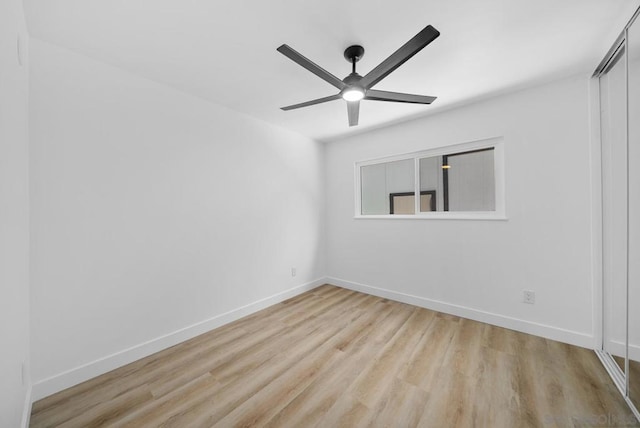 unfurnished room featuring ceiling fan and light hardwood / wood-style floors