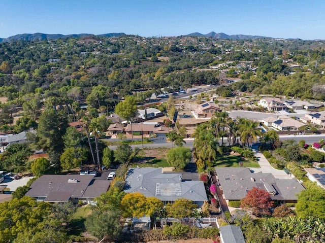 drone / aerial view featuring a mountain view