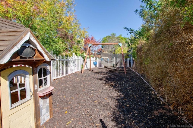 view of yard with a trampoline