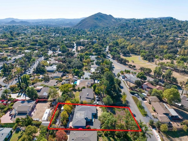 birds eye view of property featuring a mountain view