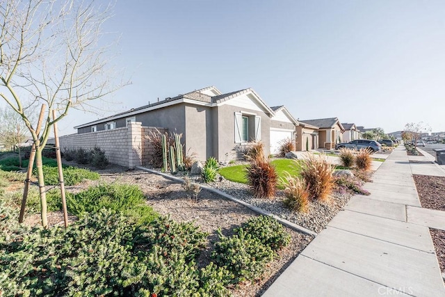 view of property exterior with a garage