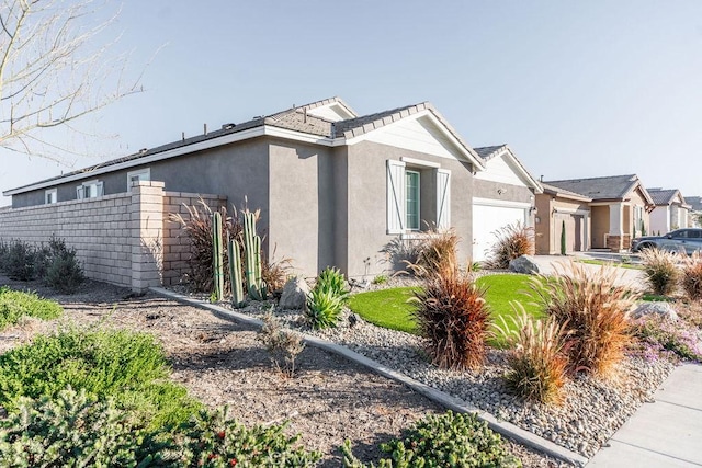 view of property exterior with a garage