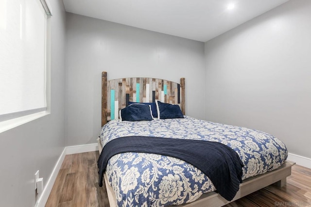 bedroom featuring hardwood / wood-style floors