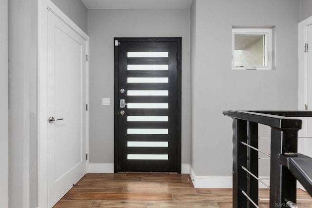 foyer entrance featuring hardwood / wood-style flooring