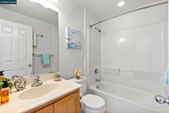 full bathroom featuring vanity, toilet, and shower / washtub combination