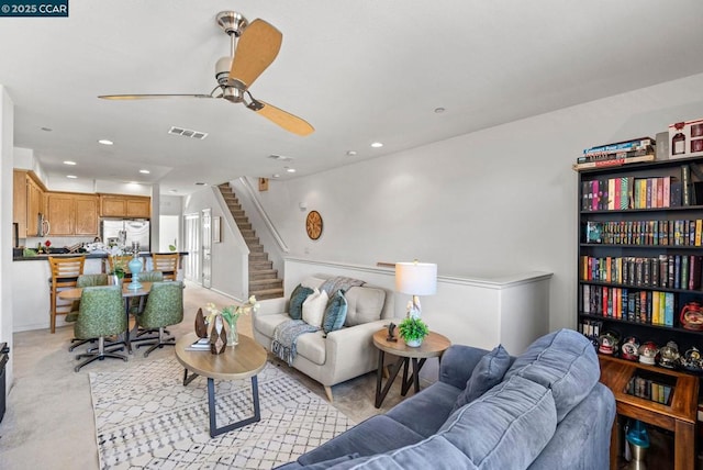 living room featuring ceiling fan