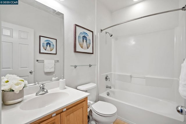 full bathroom featuring vanity, tub / shower combination, and toilet