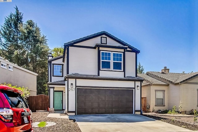 view of front of property with a garage