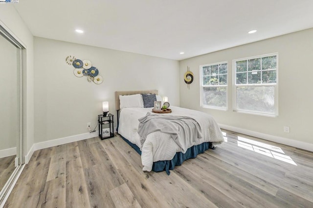 bedroom featuring light hardwood / wood-style flooring