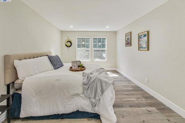 bedroom featuring light wood-type flooring