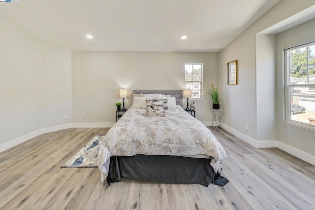 bedroom featuring light hardwood / wood-style floors