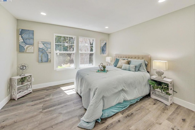 bedroom featuring hardwood / wood-style flooring