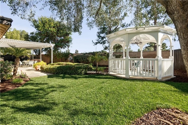 view of yard with a gazebo and a patio