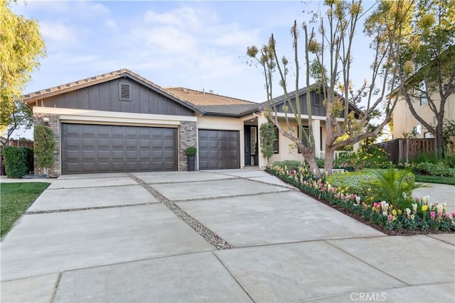 ranch-style home featuring a garage