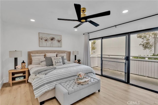 bedroom with ceiling fan, access to exterior, and light hardwood / wood-style flooring