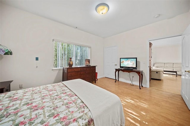 bedroom with light hardwood / wood-style floors