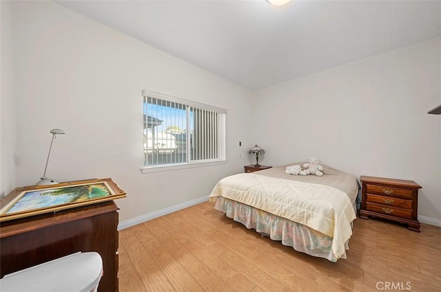 bedroom featuring hardwood / wood-style floors