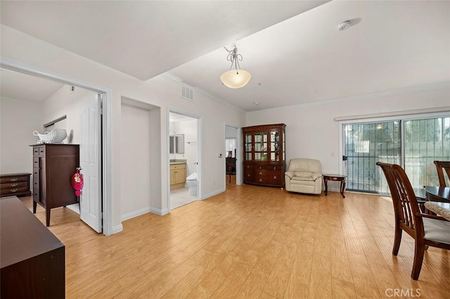 sitting room featuring light hardwood / wood-style floors