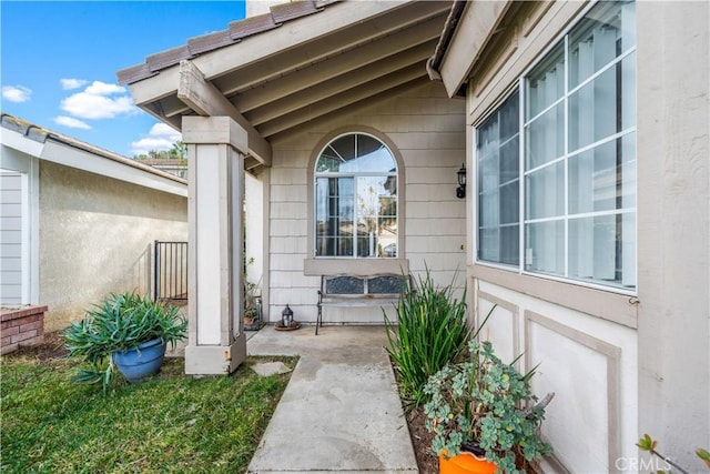 property entrance with a patio