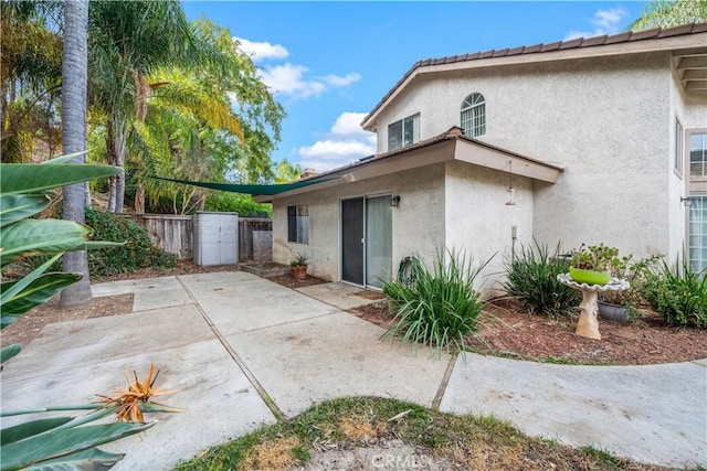 rear view of property with a patio