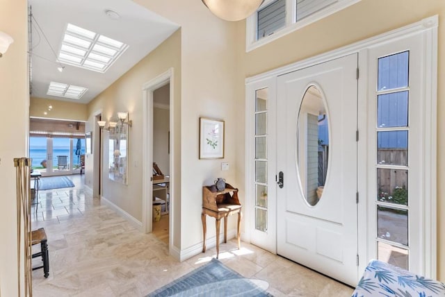 entryway with light tile patterned flooring