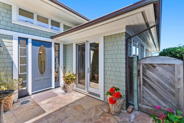 doorway to property with a patio area