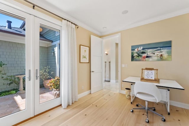 office area featuring hardwood / wood-style floors, crown molding, and french doors