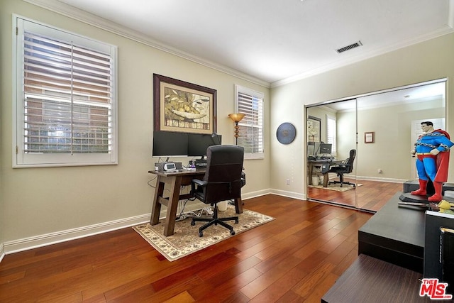 office area featuring dark wood-type flooring and ornamental molding