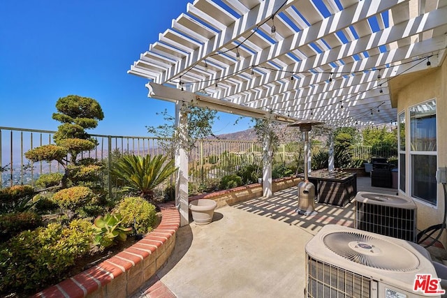 view of patio / terrace featuring a pergola and central air condition unit