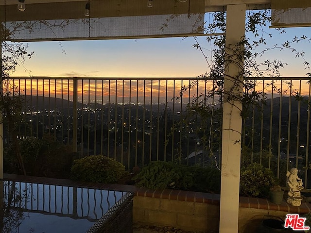 view of gate at dusk