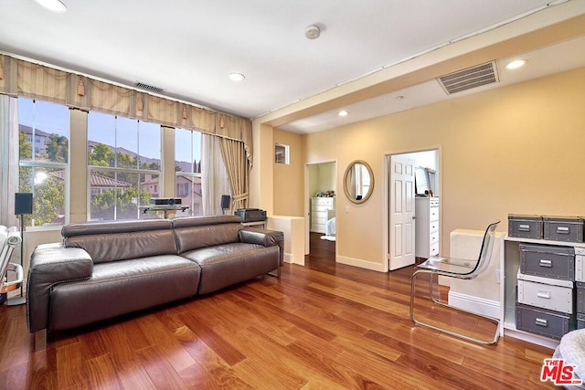 living room with hardwood / wood-style flooring