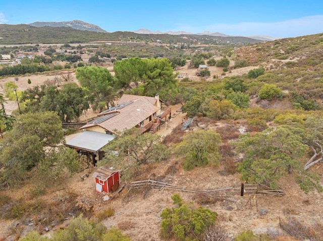 drone / aerial view featuring a mountain view