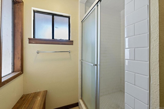 bathroom featuring walk in shower