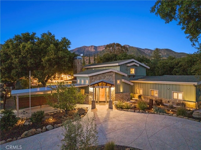 view of front of house with a mountain view