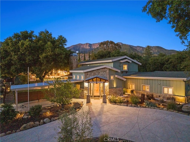 12475 Christmas Tree Rd, Ojai, CA 93023 - view of front of property featuring stone siding, board and batten siding, and a mountain view