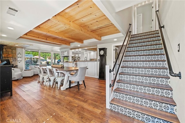 12475 Christmas Tree Rd, Ojai, CA 93023 - dining area with wood finished floors, wooden ceiling, stairs, and visible vents