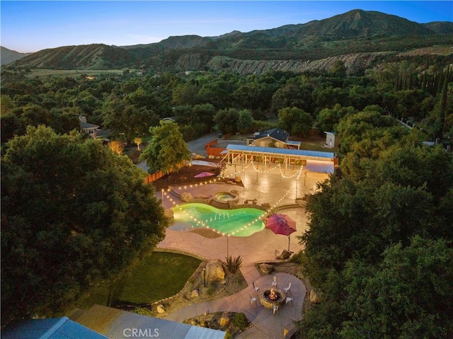 bird's eye view with a mountain view