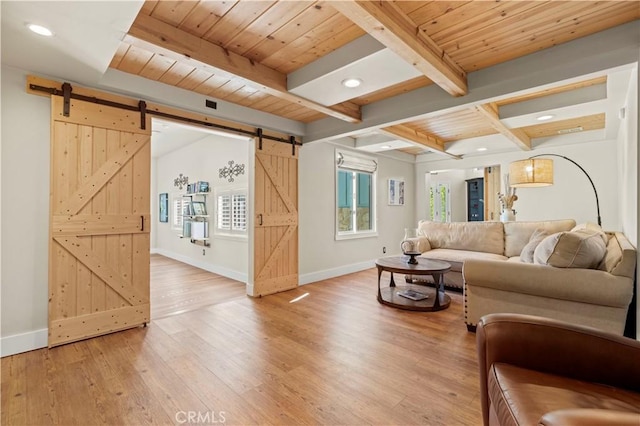 12475 Christmas Tree Rd, Ojai, CA 93023 - living room with light wood finished floors, a barn door, and beam ceiling