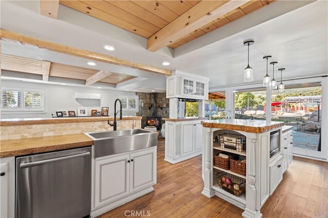12475 Christmas Tree Rd, Ojai, CA 93023 - kitchen featuring a sink, stainless steel appliances, beamed ceiling, and light wood finished floors