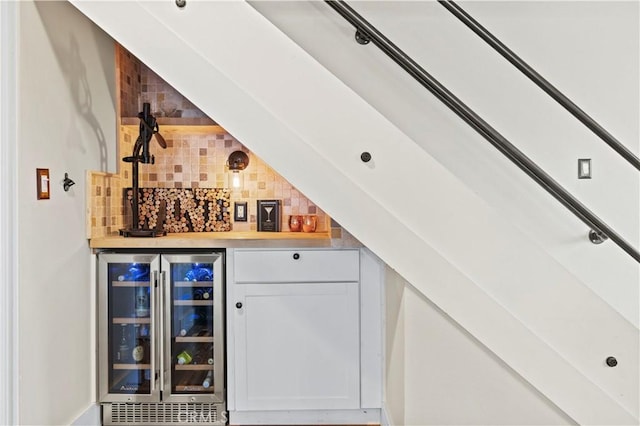 12475 Christmas Tree Rd, Ojai, CA 93023 - bar with a dry bar, wine cooler, and decorative backsplash